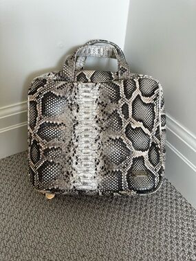 Stephanie Johnson snake skin toiletry bag